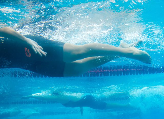 Male and female participants from Balkan countries competing in Makedonian swimming race in Thessaloniki, Greece. Swimmer kick