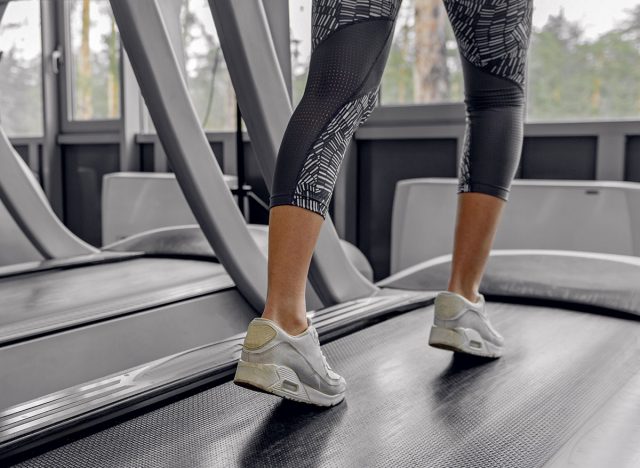 Female going on equipment in fitness center