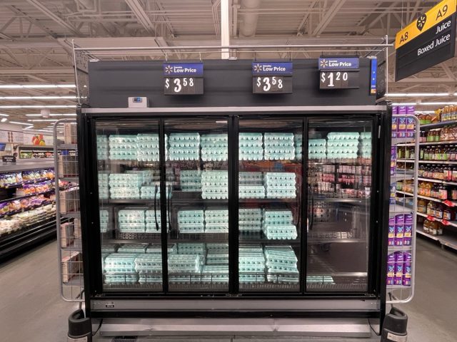 Grovetown, Ga USA - 09 30 23: Walmart grocery store Egg display and prices