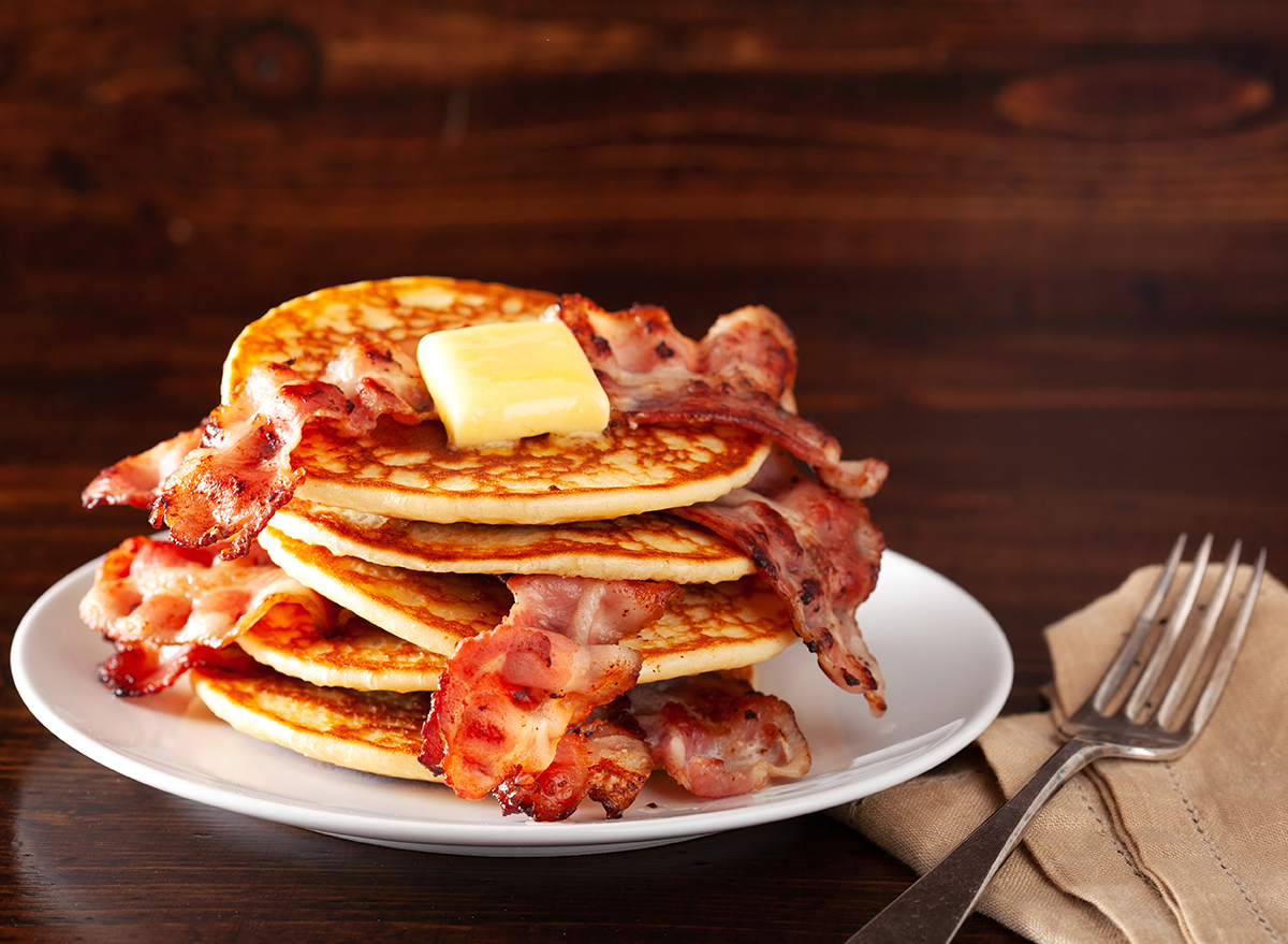 sweet pancakes with butter and bacon. traditional american breakfast